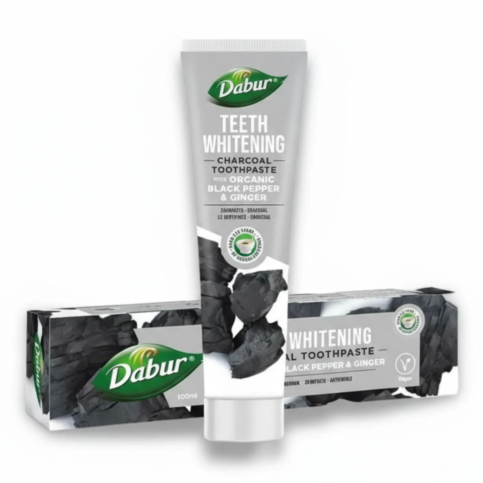 Balinanti vaistažolinė dantų pasta su aktyvinta anglimi, imbieru ir pipirais DABUR.